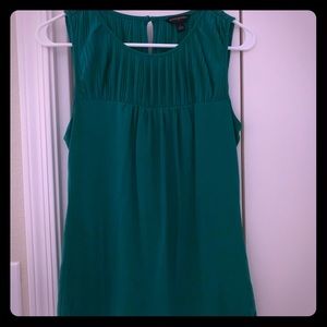 Sleeveless green blouse